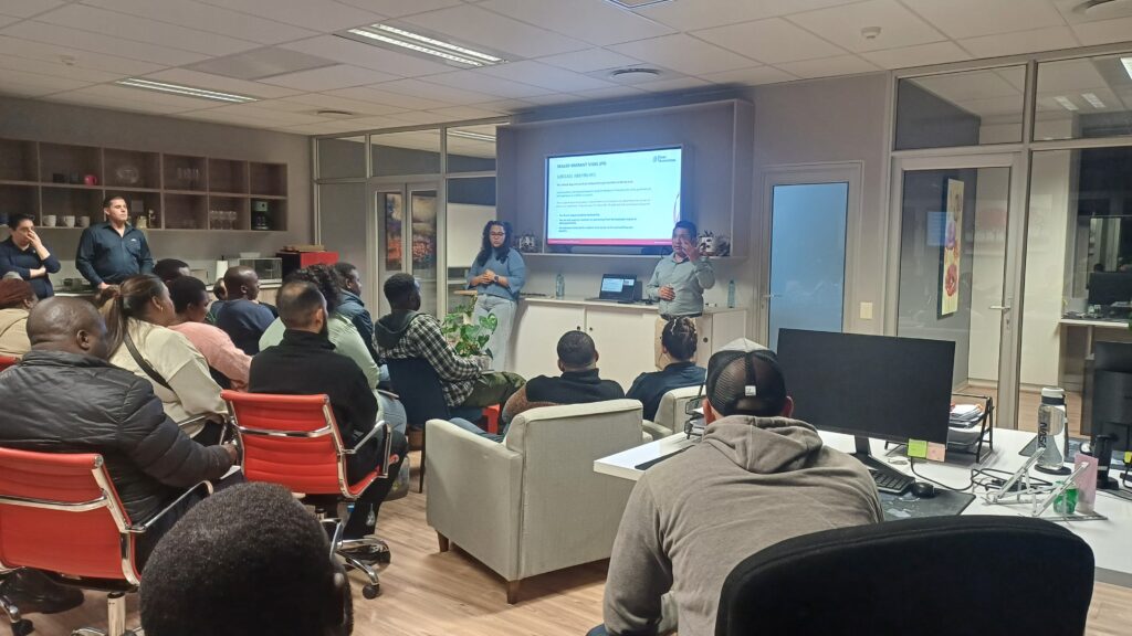 Nicole and Pete speaking at our Australian immigration seminar